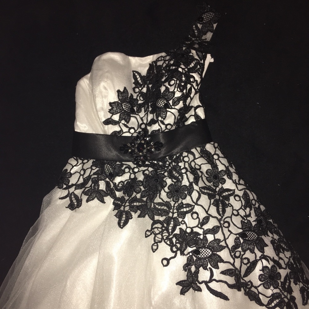 Never before worn black and white cocktail dress!